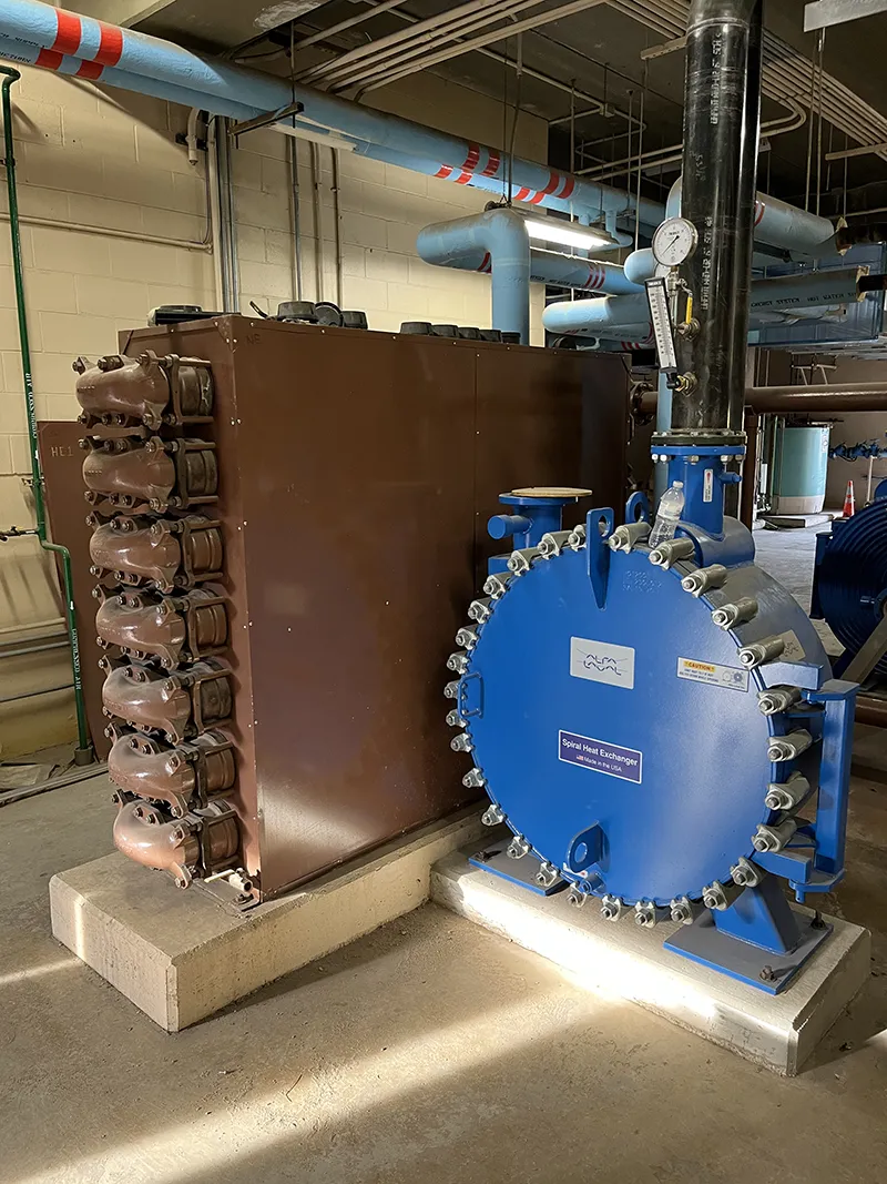 Replacement heat exchanger is blue on right. old heat exchanger is brown on left